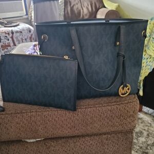 Michael Korss jet set reversible tote with wristlet